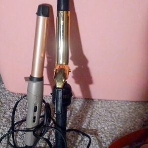 2 PAIRS OF CURLING IRONS, GETS REALLY HOT!!